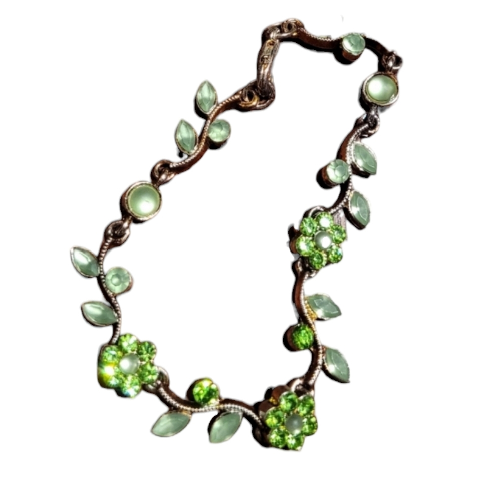 Matching necklace, bracelet, and earring set